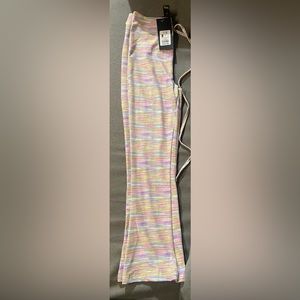 New with tags. Girls size 7/8 flare leg leggings